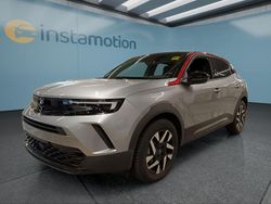 Grau Gebraucht 2024 Opel Mokka-e SUV | 24.399 € (Etwas zu teuer)