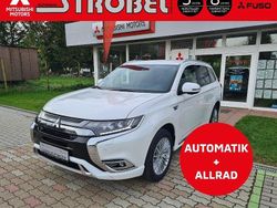 Perlmuttweiß Gebraucht 2021 Mitsubishi Outlander P-HEV Plus SUV | 23.980 € (Fairer Preis)