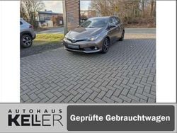 Platinum bronze metallic Gebraucht 2017 Toyota Auris Hybrid Basis Limousine | 16.460 € (Fairer Preis)
