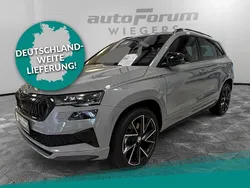 Grau Gebraucht 2024 Skoda Karoq SportLine SUV | 36.981 € (Fairer Preis)