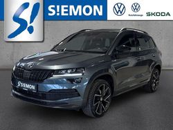 Grau Gebraucht 2021 Skoda Karoq SportLine SUV | 26.230 € (Fairer Preis)