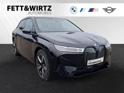 Black sapphire metallic Gebraucht 2024 BMW iX Sport Line SUV | 64.888 € (Guter Preis)