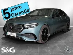Metalliclack verdesilber Gebraucht 2024 Mercedes E300 AMG Limousine | 76.499 €