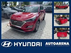 Fiery red / met Gebraucht 2020 Hyundai Tucson Premium SUV | 22.995 € (Guter Preis)