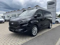 Obsidianschwarzmetallic Gebraucht 2024 Ford Tourneo Custom Titanium Van / Kleinbus | 54.990 €