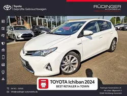 Novaweißpearleffect (metallic) Gebraucht 2013 Toyota Auris Hybrid Executive Limousine | 11.890 € (Fairer Preis)