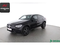 Schwarz (metallic) Gebraucht 2021 Mercedes GLC300e AMG Coupé | 42.879 € (Fairer Preis)