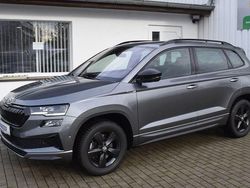 Grau Gebraucht 2024 Skoda Karoq SportLine SUV | 32.990 € (Fairer Preis)