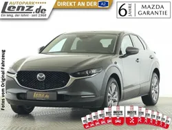Machine gray Gebraucht 2024 Mazda CX-30 Exclusive-Line SUV | 28.930 € (Fairer Preis)