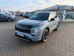 Grau Gebraucht 2025 Mitsubishi Outlander P-HEV Top SUV | 56.990 €