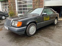 199 blauschwarzmetallic Gebraucht 1989 Mercedes E300 Coupé | 22.500 €
