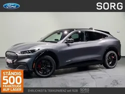 Grau, carbonized grey metallic Gebraucht 2024 Ford Mustang Mach-E Extended Range SUV | 46.280 € (Fairer Preis)