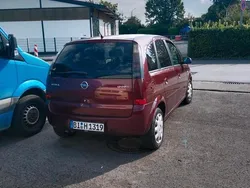 Rot Gebraucht 2004 Opel Meriva Van / Kleinbus | 2.500 € (Teuer)