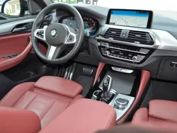 Flamencorot brillanteffekt met Gebraucht 2020 BMW X4 Performance SUV | 49.000 € (Etwas zu teuer)