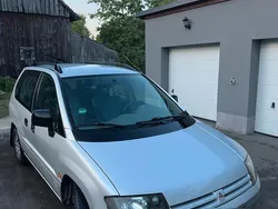 Grau Gebraucht 2000 Mitsubishi Space Runner Van / Kleinbus | 1.333 €
