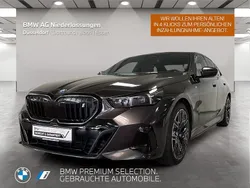 Grau Gebraucht 2024 BMW i5 M Sport Limousine | 66.990 €