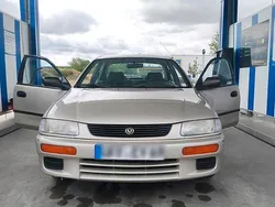 Grau Gebraucht 1995 Mazda 323S Limousine | 1.300 €