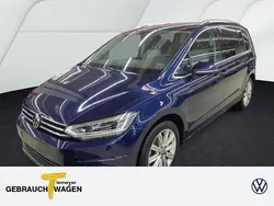 Blau Gebraucht 2024 VW Touran Highline Van / Kleinbus | 34.870 € (Fairer Preis)