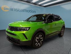 Grün Gebraucht 2024 Opel Mokka SUV | 24.799 € (Etwas zu teuer)