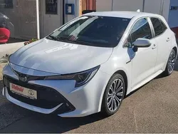 Schneeweiß Gebraucht 2020 Toyota Corolla Hybrid Club Kleinwagen | 19.900 € (Guter Preis)