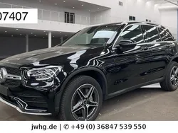 Obsidianschwarz (metallic) Gebraucht 2021 Mercedes GLC300e AMG SUV | 35.950 € (Fairer Preis)