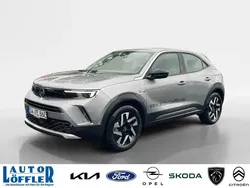 Kontrast grau (silber) Gebraucht 2022 Opel Mokka-e SUV | 22.480 € (Etwas zu teuer)
