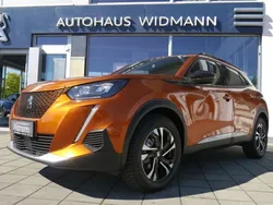 Orange Gebraucht 2023 Peugeot e-2008 Allure SUV | 19.895 € (Guter Preis)