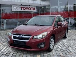 Venetian red (p) Gebraucht 2014 Subaru Impreza Comfort Limousine | 9.790 €