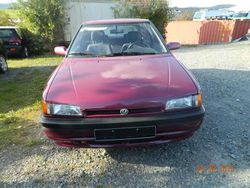 Violett Gebraucht 1994 Mazda 323 Limousine | 1.600 €