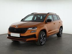 Phoenixorange metallic Gebraucht 2024 Skoda Karoq SportLine SUV | 32.740 € (Fairer Preis)