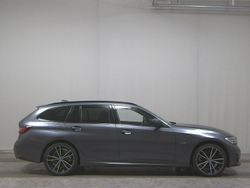 Grau Gebraucht 2021 BMW 320e M Sport Kombi | 23.680 € (Guter Preis)