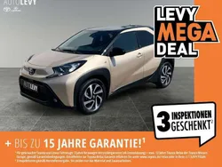 Ginger beige 4u9/ black mica 2 Gebraucht 2024 Toyota Aygo Team Kleinwagen | 19.998 € (Teuer)