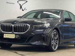 Carbonschwarz metallic Gebraucht 2024 BMW 550e Comfort Edition Limousine | 69.998 € (Guter Preis)