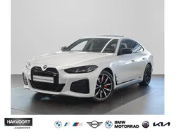 Mineralweiß metallic Gebraucht 2024 BMW i4 Comfort Edition Limousine | 55.270 € (Guter Preis)