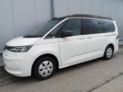 Candyweiß dach schwarz Gebraucht 2024 VW T7 Beach Van | 60.390 €