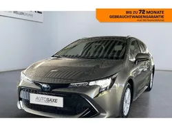 Mangabronze metallic Gebraucht 2021 Toyota Corolla Team Kombi | 21.990 € (Fairer Preis)