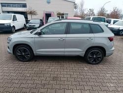 Grau Gebraucht 2024 Skoda Karoq SportLine SUV | 29.900 € (Superpreis)