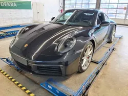 Schwarz (metallic) Gebraucht 2023 Porsche 911 Carrera 4S Coupé | 139.990 € (Fairer Preis)