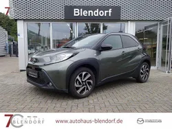 Grün Gebraucht 2023 Toyota Aygo Pulse Kleinwagen | 15.900 € (Fairer Preis)