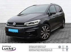 Grau (uranograu) Gebraucht 2024 VW Touran Highline Van / Kleinbus | 51.950 €