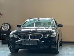 Schwarz ii/bonnet fluid black Gebraucht 2022 BMW 320e Advantage Kombi | 18.980 € (Superpreis)