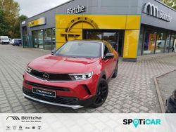 Lackierung rot rubi/typ aussenverkleidung metalliclackierung Gebraucht 2024 Opel Mokka-e Ultimate SUV | 23.990 € (Fairer Preis)
