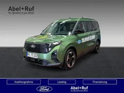 Grün Gebraucht 2024 Ford Tourneo Courier Titanium Van / Kleinbus | 25.991 € (Fairer Preis)
