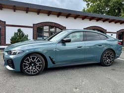 Grün Gebraucht 2024 BMW i4 Performance Limousine | 61.890 € (Etwas zu teuer)