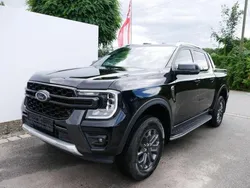 Obsidianschwarz (metallic) Gebraucht 2024 Ford Ranger Wildtrack Abholung | 44.430 € (Fairer Preis)