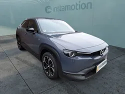 Grau Gebraucht 2024 Mazda MX30 Ad'Vantage SUV | 28.490 € (Fairer Preis)