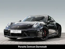 Tiefschwarzmetallic Gebraucht 2023 Porsche 911 Carrera 4S Coupé | 161.777 €