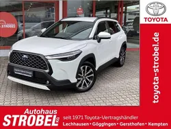 Schneeweiß Gebraucht 2023 Toyota Corolla Cross Team SUV | 31.980 € (Fairer Preis)
