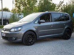 Grau Gebraucht 2011 VW Touran Van / Kleinbus | 14.899 €