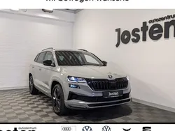 Grau Gebraucht 2024 Skoda Karoq SportLine SUV | 34.890 € (Superpreis)